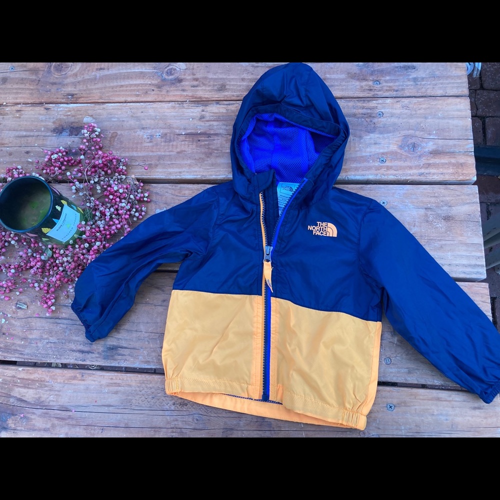 North Face Windbreaker 6-12mos. Blue and yellow.